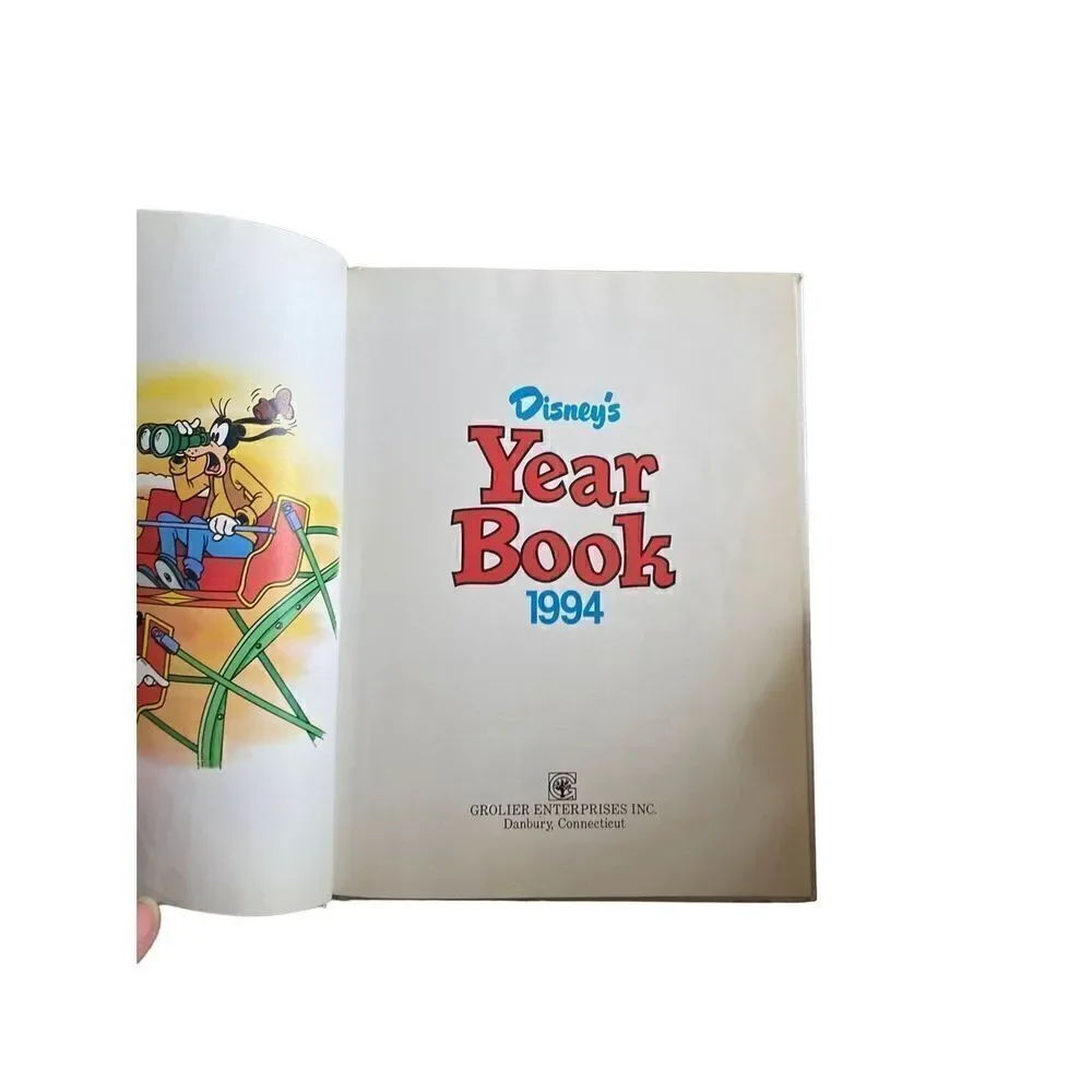 Vintage Disney hard cover yearbook 1994 color photos. Cartoon drawings 10 x 8.